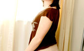 Nubiles Camille 247700 Lovely Camille Standing Besides Window Alluring With A Cute Smile
