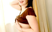 Nubiles Camille 247705 Amateur Teen Camille Sitting On Small Couch Exposing Her Lovely Bosoms
