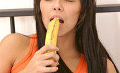 Nubiles Lana 247904 Long Black Haired Lana Arousing Herself More By Licking Hard On Banana
