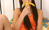Nubiles Lana 247904 Long Black Haired Lana Arousing Herself More By Licking Hard On Banana
