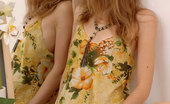 Nubiles Emanuelle 248064 Seductive College Girl Admires Herself In A Flimsy Summer Dress

