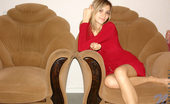 Nubiles Katrina 248201 Alluring Katrina In Red Dress Seductively Sitting On Chair
