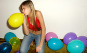 Nubiles Katrina 248234 Tempting Katrina Blowing And Playing Colorful Balloons Then Reveals Pink Panty
