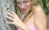 Nubiles Milana 248352 Flirty Looking Milana Striking Her Best Teasing Pose In The Woods
