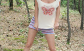 Nubiles Milana 248353 Well Endowed Teen Stripper All Fired Up To Pose Naked In The Woods
