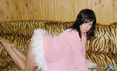 Nubiles Holly 248566 Hot Alluring Teenie In Feathered Blouse Posing With Her Legs Wide Open
