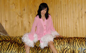 Nubiles Holly 248566 Hot Alluring Teenie In Feathered Blouse Posing With Her Legs Wide Open
