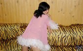 Nubiles Holly 248566 Hot Alluring Teenie In Feathered Blouse Posing With Her Legs Wide Open

