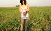 Nubiles Holly 248572 Lovely Teen Hottie Just Pick Up Some Fresh Flowers In The Field And Posing
