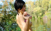 Nubiles Holly 248590 Topless Amateur Teenie Letting Her Juicy Assets Exposed In The Woods
