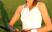 Nubiles Belinda 248688 A Perfect Sporty Teen Chick Posing With Her Tennis Racket On Grassy Playground
