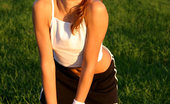 Nubiles Belinda 248688 A Perfect Sporty Teen Chick Posing With Her Tennis Racket On Grassy Playground
