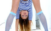 Nubiles Ekaterina 248735 Flexible Ekaterina In Pantyhose Stretching Legs On Hte Laundry Room Tiles
