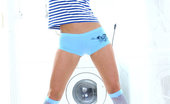 Nubiles Ekaterina 248735 Flexible Ekaterina In Pantyhose Stretching Legs On Hte Laundry Room Tiles
