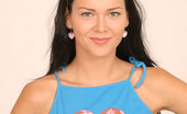 Nubiles Suzie 249542 Barely Legal Teen Wearing Blue Shirt And Sexy White G-String Showing Her Nice Round Ass
