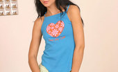 Nubiles Suzie 249542 Barely Legal Teen Wearing Blue Shirt And Sexy White G-String Showing Her Nice Round Ass

