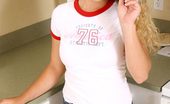 Nubiles Hallee 249860 Hot Brunette Teen With Curly Hair Taking Off Her Shirt And Posing In The Kitchen
