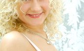 Nubiles Tamara 249881 Charming Teen Blonde Graciously Smiling And Showing Her Tempting Cleavage

