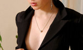 Nubiles Carmen 249974 Brunette Teen Model In Black Office Wear Posing And Teasing Indoors
