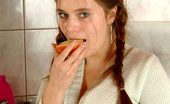 Nubiles Synthia 250222 This Girl Looks So Hot And Sultry While Eating Apple In The Kitchen
