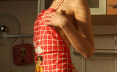 Nubiles Adel 250477 Kiss The Cook Is All Adel Has On Her Mind Completely Naked And Only In An Apron
