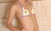 Nubiles Paula 250743 Hottie Paula Is Having Fun In Shower In Her Sexy Yellow Bikini Will She Take It Off Tho
