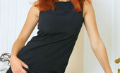 Nubiles Dasha 251022 Dasha Is In A Tight Black Long Dress And Just Showing Off With Her Red Hair Down
