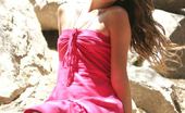 Nubiles Tresseme 251564 Sexy Teen Sits Out On Some Rocks In The Shadows In Her Pink Prom Like Dress So Sexy

