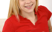 Nubiles Leah 251825 Leah Lets Her Long Blonde Hair Down And Smiles Showing Off Her Braces Topless
