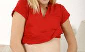 Nubiles Leah 251825 Leah Lets Her Long Blonde Hair Down And Smiles Showing Off Her Braces Topless
