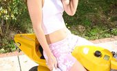 Nubiles Jenny 251856 Long Haired Hottie Jenny Sits On Her Mini Bike And Spreads Her Legs Open
