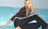Nubiles Katrina Cutie Hangs Out Lounging In Her Work Out Clothes Looking Great
