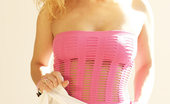 Nubiles Stefani Sexy Teen In Fishnets And A Pink Dress

