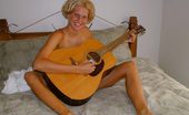 Nubiles Meg Hot Teen Gets Off Playing Guitar In The Nude
