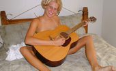 Nubiles Meg 252474 Hot Teen Gets Off Playing Guitar In The Nude
