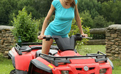 ALS Angels Eufrat10s 255624 Eufrat Strips And Poses On Top Of An ATV
