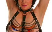 Michelle Aston 256989 Tattooed Busty Milf In Chain And Leather Harness
