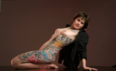 Michelle Aston 257003 Tattooed Milf Shows Off Extensive Ink
