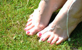 Nylon Jane 261594 Gorgeous Paige Gets Her Feet Nice And Wet Before She Licks Them Clean.
