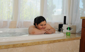 CJ Wright 264646 Latina BBW Karla Lane Posing In A Soapy Tub
