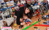 Sabrina Squirts 270339 Sabrina Plops Down Amidst A Sea Of Action Figures And Other Awesome Toys For This Unique Set That Shows Off A Bit Of Her Geeky Side. Check Out The Sweet Ninja Turtles Hoodie!
