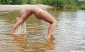 Showy Beauty Evgenia Busty Nympha Bustyblonde Chubby Blonde With Natural Big Tits Juicy Butt Playfully Bathes In The Lake Totally Naked.

