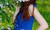 Showy Beauty Mulana Luce Viva Hotredheadgirl 273070 Charming Redhead Girl With Bow In Hair Stripping And Spreading Legs Among The Flowering Trees.
