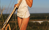 Showy Beauty Dana Study Drawing Sexy Painter 273117 Gorgeous Beauty Showing Tempting Nude Body While Drawing A Picture Outdoors In The Field.
