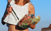Showy Beauty Dana Study Drawing Sexy Painter 273117 Gorgeous Beauty Showing Tempting Nude Body While Drawing A Picture Outdoors In The Field.
