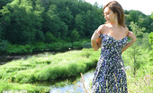 Showy Beauty Dana Fresh Grass Cutiemeadow 273425 Busty Beauty Queen Enjoys The Warm Sunshine Beside Crystal Clear Creek. Natural Beauty In Natural Environment. The Best Combination.
