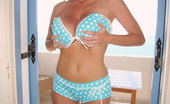 Kelly Madison Santorini Bikini Kelly Is Playing With Herself In Santorini In A Blue Poka Dot Bikini.
