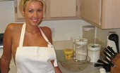 Kelsey XXX 277635 A Blonde Babe Wearing Only An Apron Bakes Cookies
