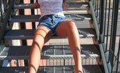 Kelsey XXX 277636 A Pretty Co Ed Poses Topless On A Fire Escape
