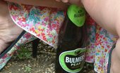 UK Flashers 277730 Mature British Woman Masturbating With A Beer Bottle In The Streets
